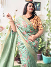 Incandescent Silk Linen Embroidered Green Saree