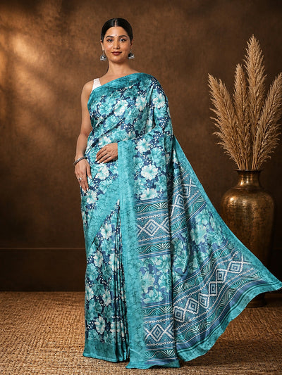 Teal and turquoise floral printed Kashmiri Silk saree with a wide geometric diamond-band pallu in white.