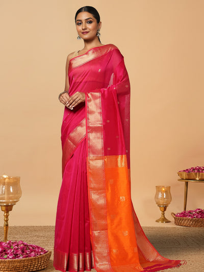 Handloom Maheshwari silk saree, fuchsia body with flower buti, orange pallu with lotus buti and a golden zari border